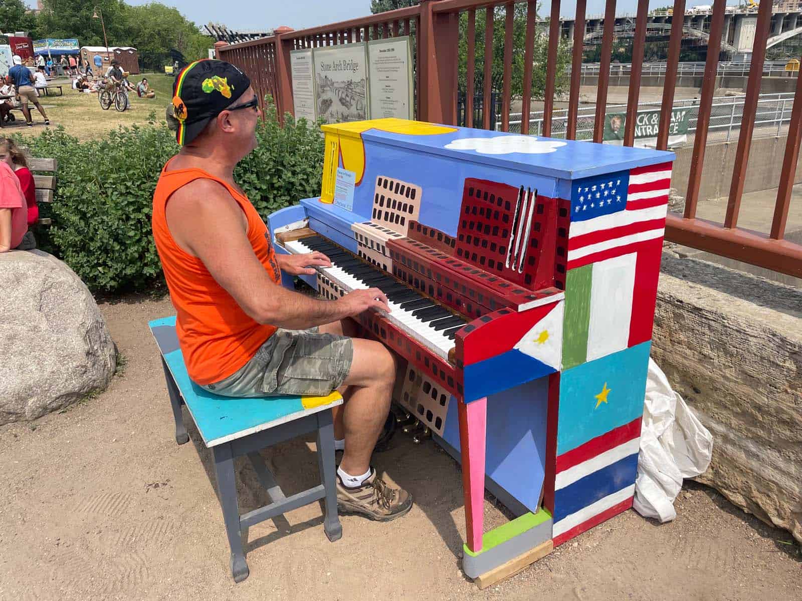 Playing piano in Mill Ruins Park