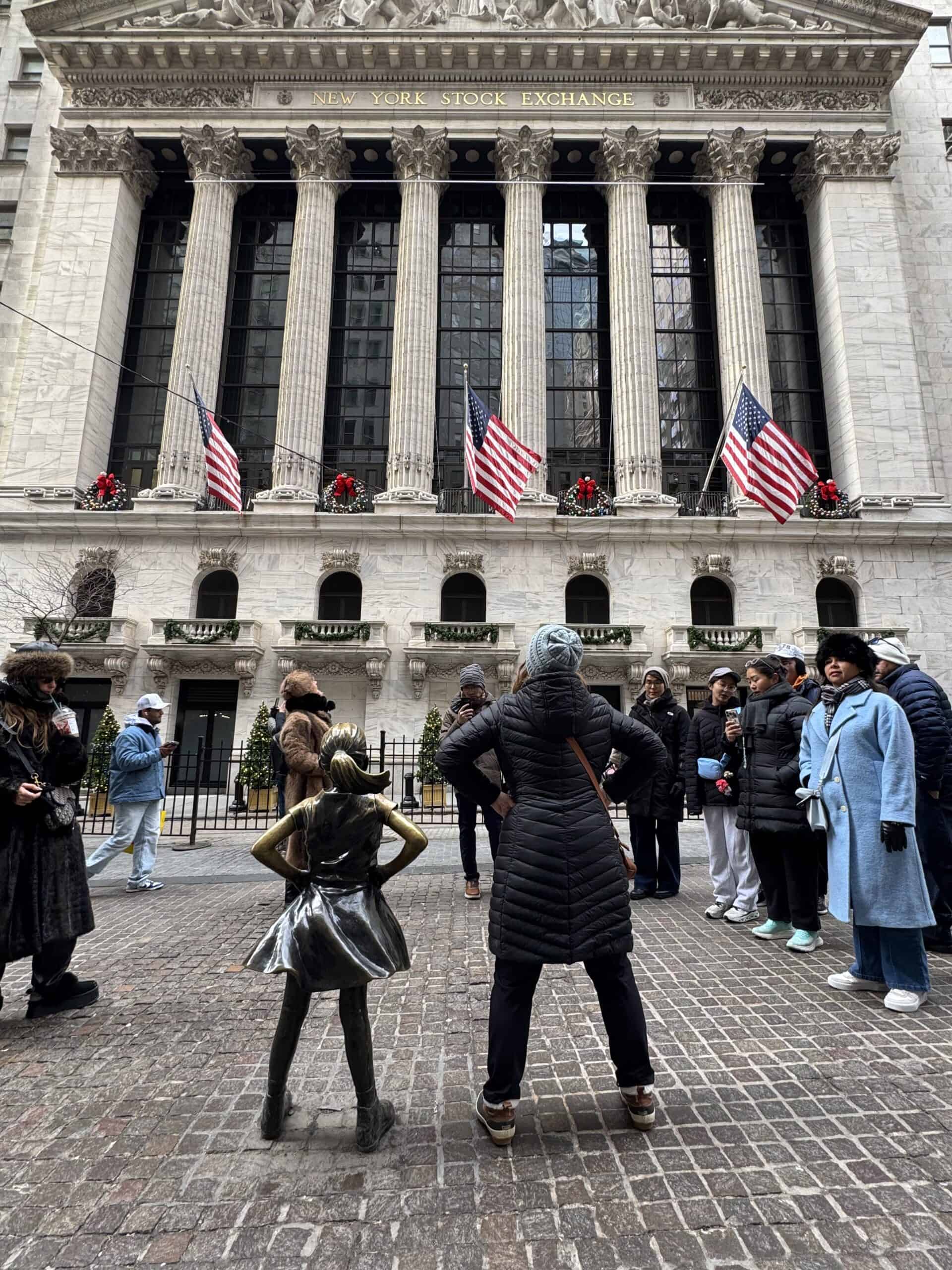 Standing fearless outside the New York Stock Exchange